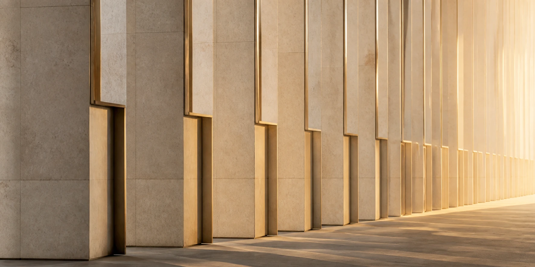 A sequence of warm stone and bronze thresholds carries light forward.