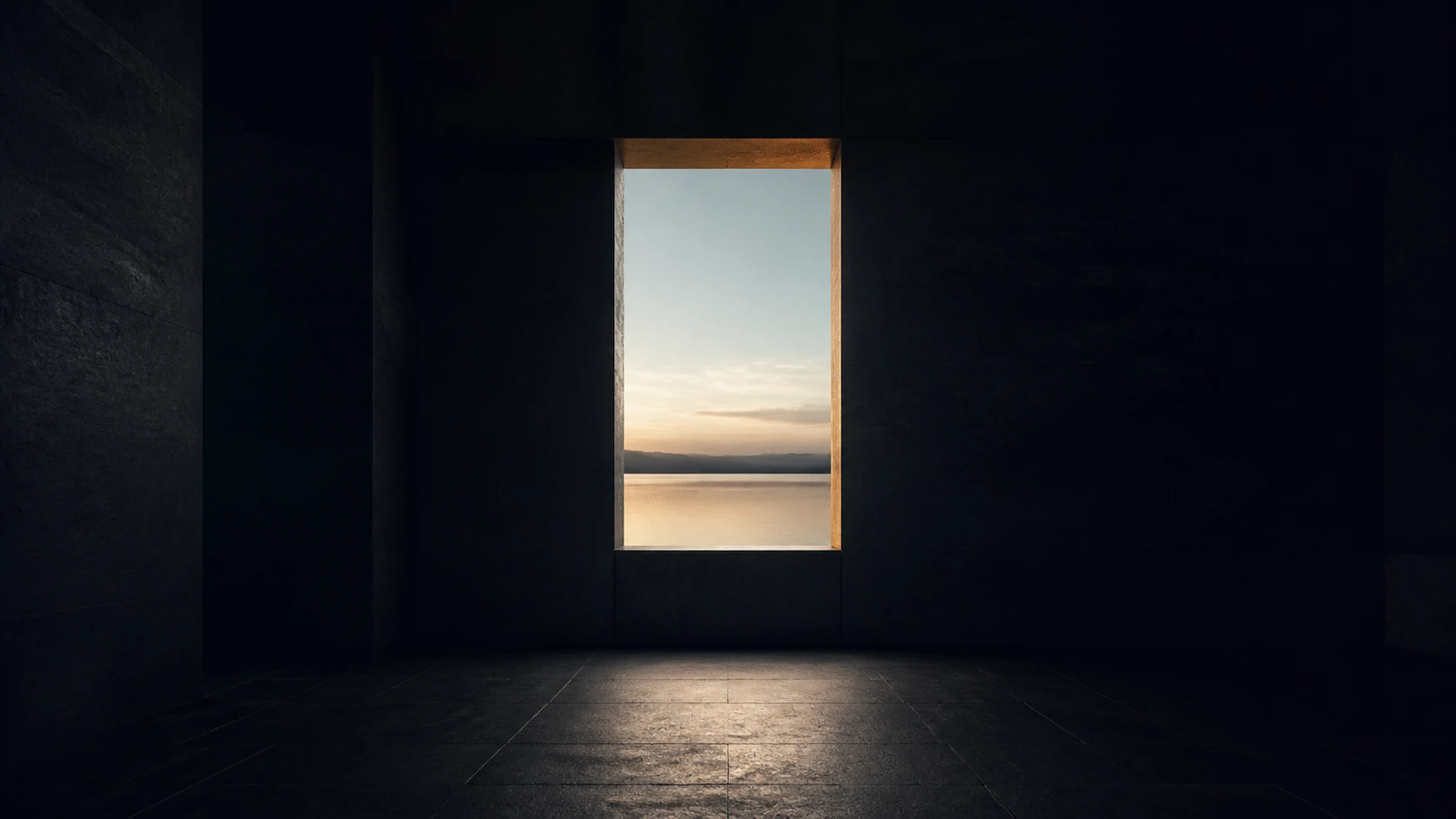 A sheltered room frames a narrow opening toward still water.
